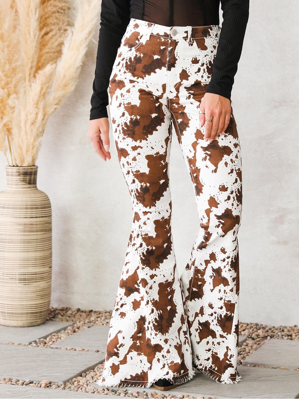 Buckle saints & hearts high waisted brown cow print flare jeans